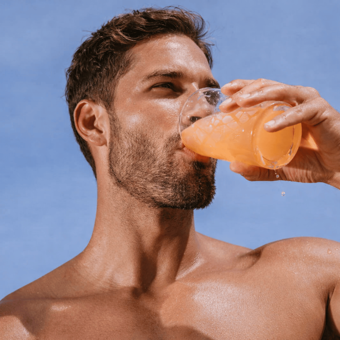 a man drinking phase west