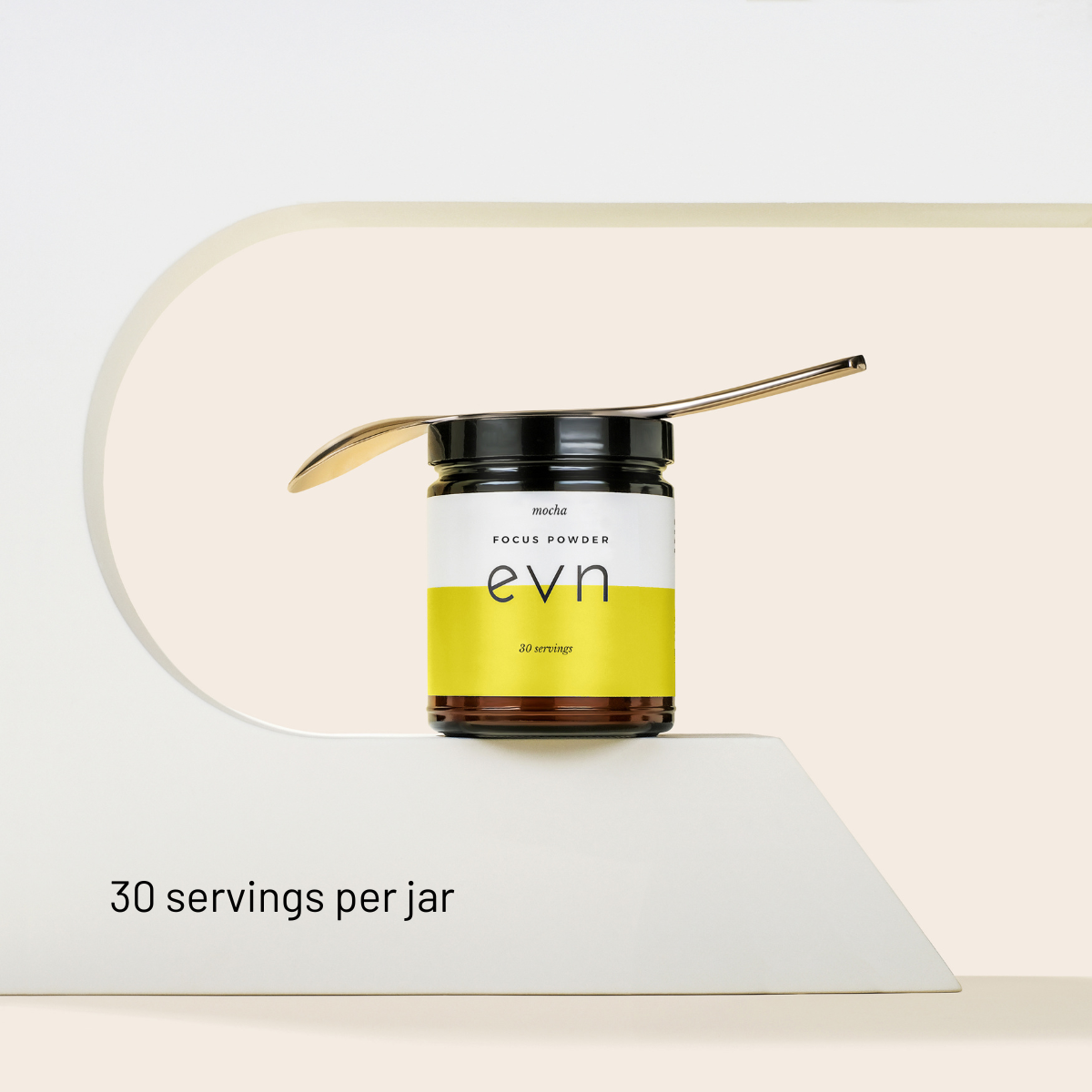 mocha mushroom coffee with a spoon on top of the jar