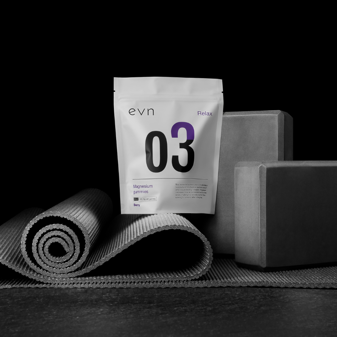 magnesium gummies with a yoga mat and blocks